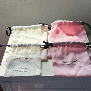 Kate Spade Pink and White Pouch Set
